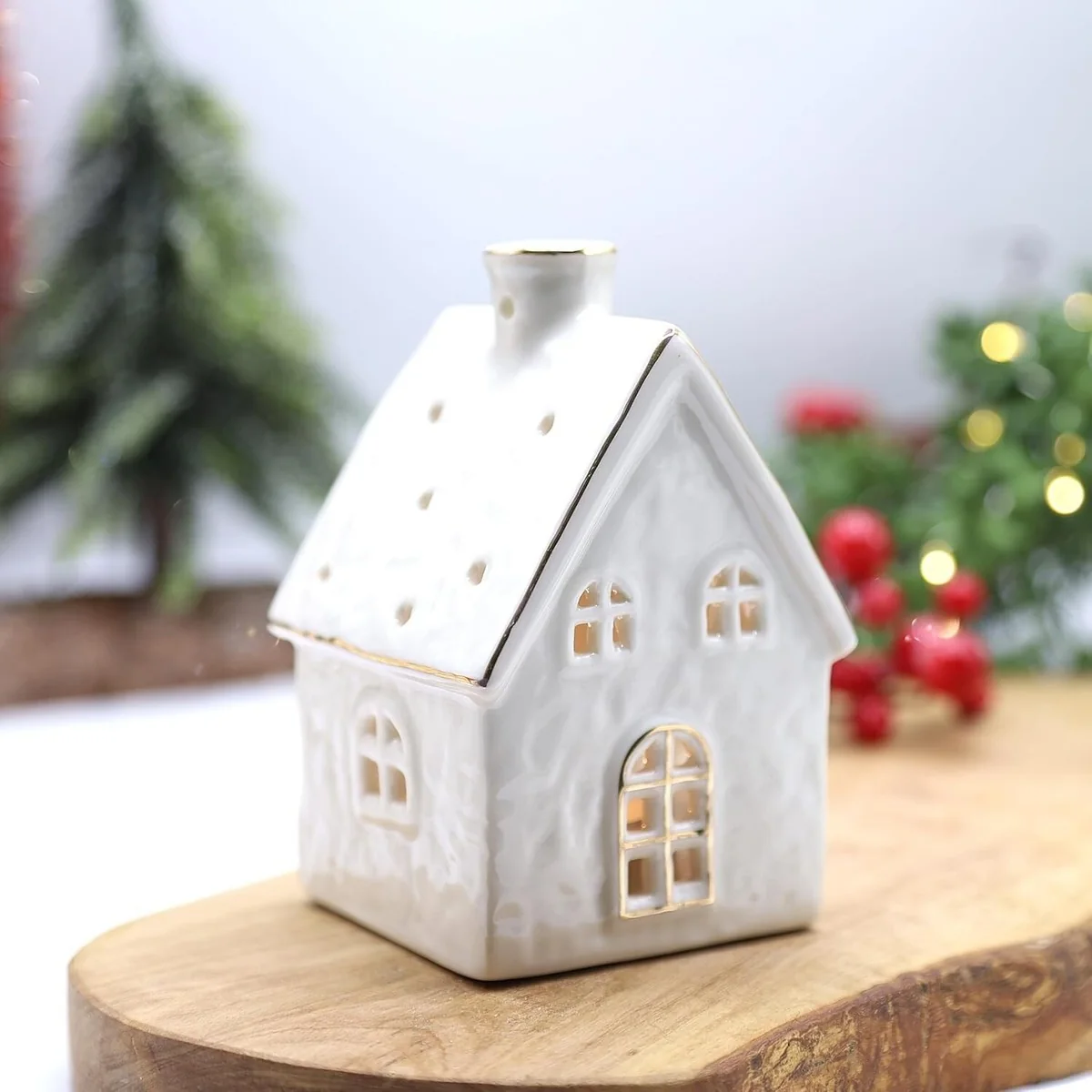 White ceramic festive tealight house